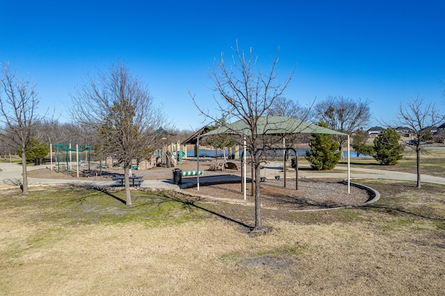 view of jungle gym with a lawn