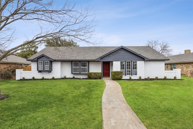 ranch-style house with a front yard