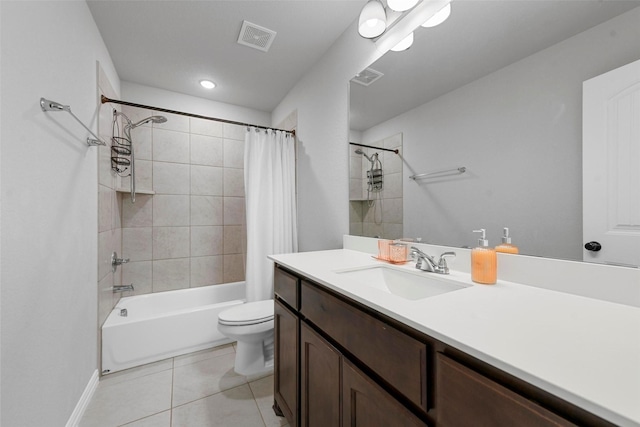 full bathroom with toilet, vanity, shower / bath combo, and tile patterned flooring