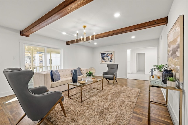 living room with a chandelier, dark hardwood / wood-style floors, and beam ceiling