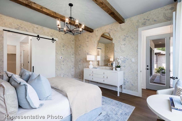 bedroom featuring an inviting chandelier, a barn door, dark hardwood / wood-style floors, and beam ceiling