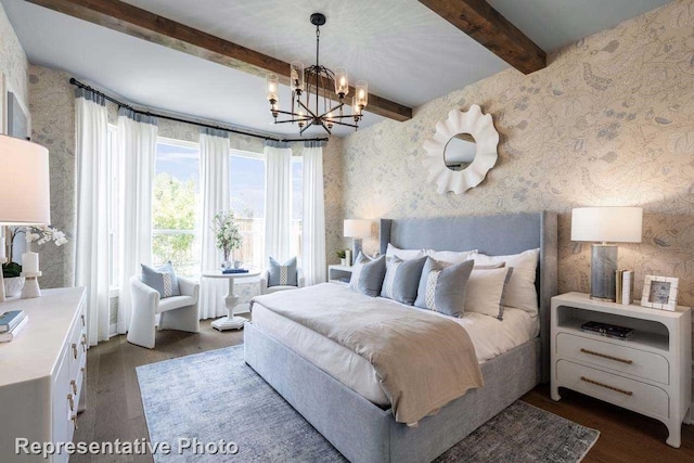 bedroom featuring dark hardwood / wood-style floors, beam ceiling, and an inviting chandelier