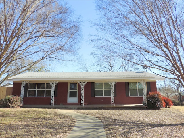 ranch-style house with a front yard