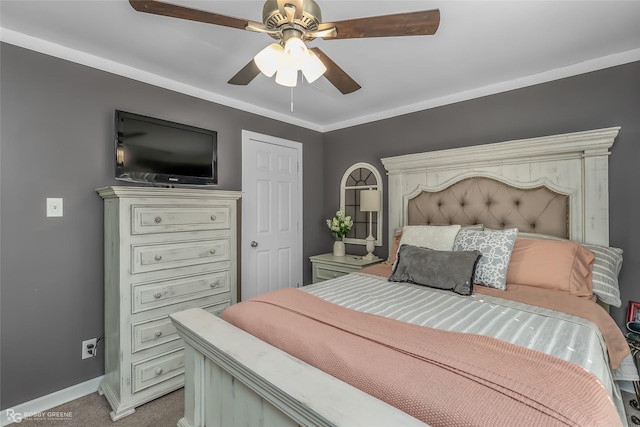 bedroom with ceiling fan and light carpet