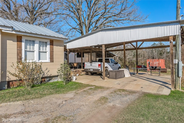 view of parking with a carport