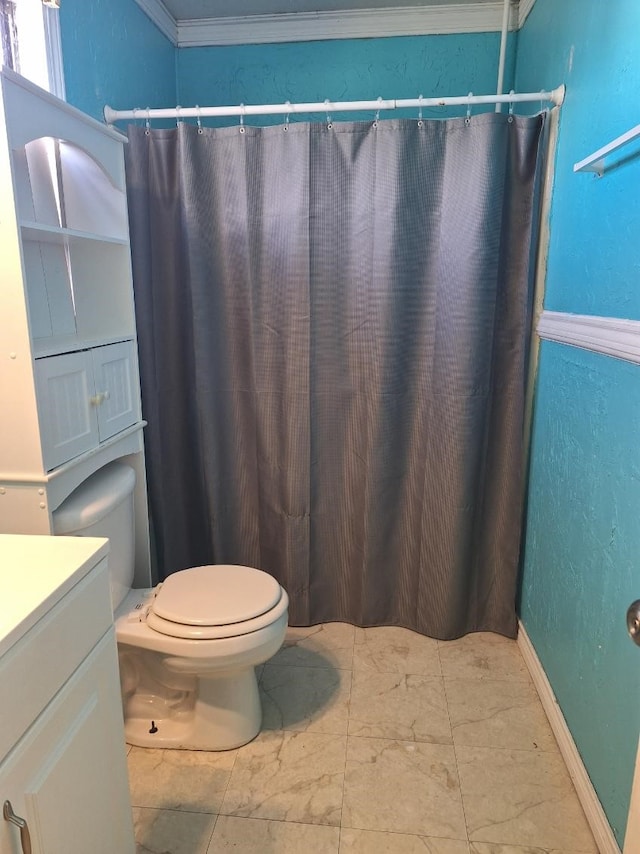 full bath with vanity and toilet