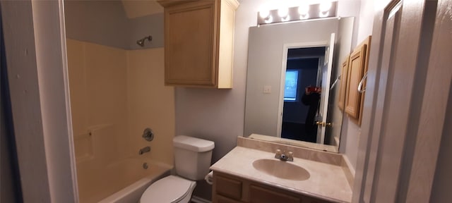 bathroom with shower / bathing tub combination, vanity, and toilet