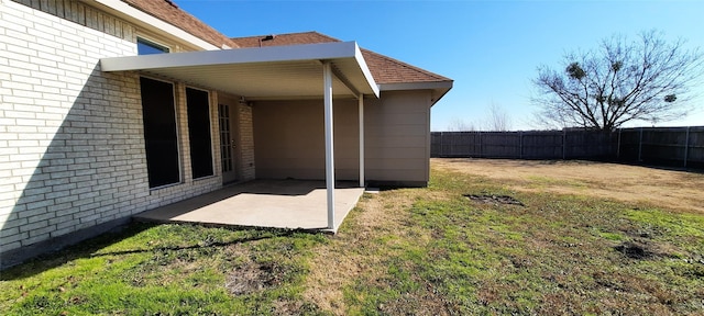 view of yard with a patio area and fence