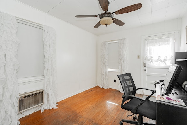 office space with ceiling fan and dark hardwood / wood-style floors