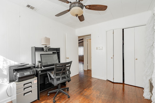 bedroom featuring hardwood / wood-style flooring and ceiling fan