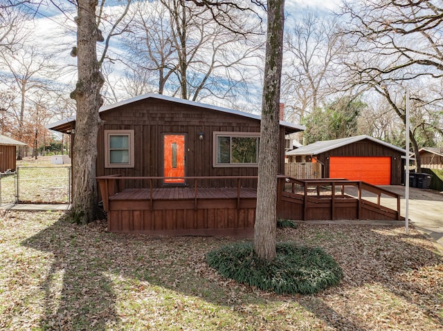 view of front of property with a front yard and a garage