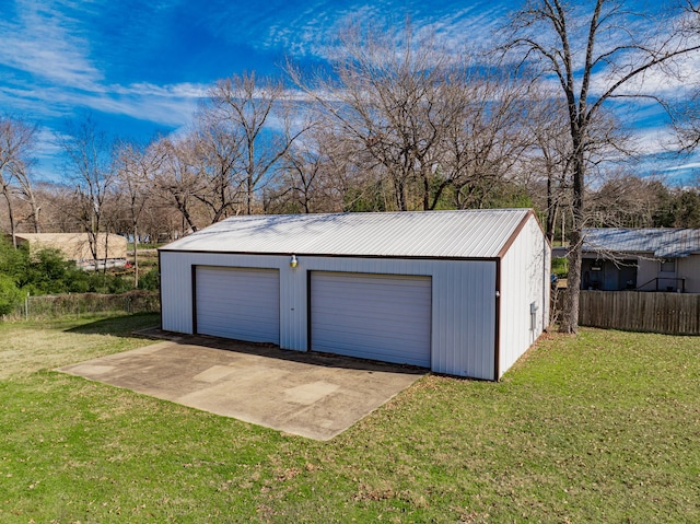 garage with a lawn