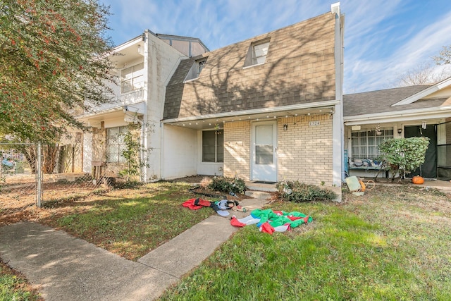 view of front of home with a front yard