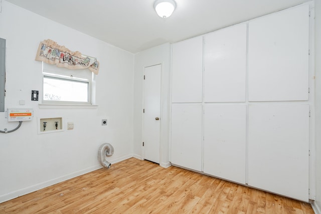 laundry room featuring hookup for an electric dryer, light wood-type flooring, and hookup for a washing machine