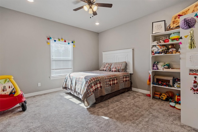 carpeted bedroom featuring ceiling fan