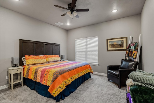 bedroom featuring ceiling fan and light colored carpet