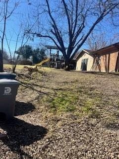 view of yard with a playground