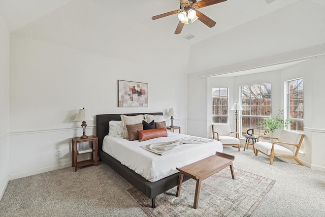 carpeted bedroom with vaulted ceiling, a ceiling fan, visible vents, and baseboards