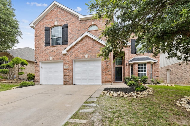 front facade featuring a garage and a front yard