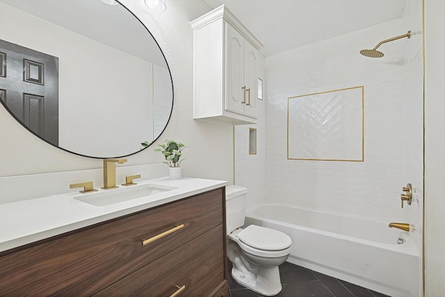 full bath featuring toilet, tile patterned floors, vanity, and bathing tub / shower combination