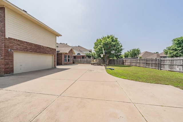 view of yard with a garage