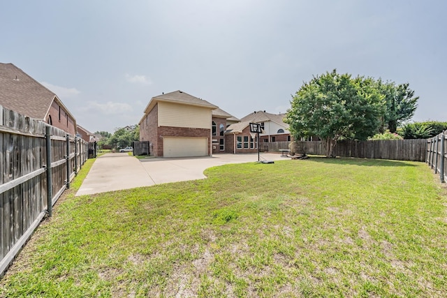 view of yard featuring a garage