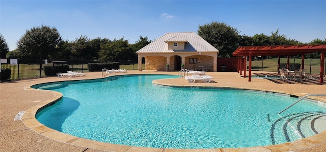 view of swimming pool with a patio area and a pergola