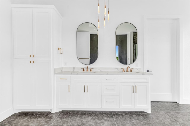 bathroom with tile patterned floors and vanity