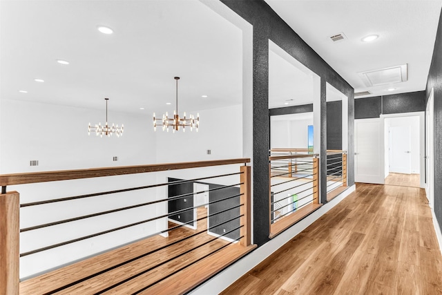 hallway featuring light hardwood / wood-style flooring