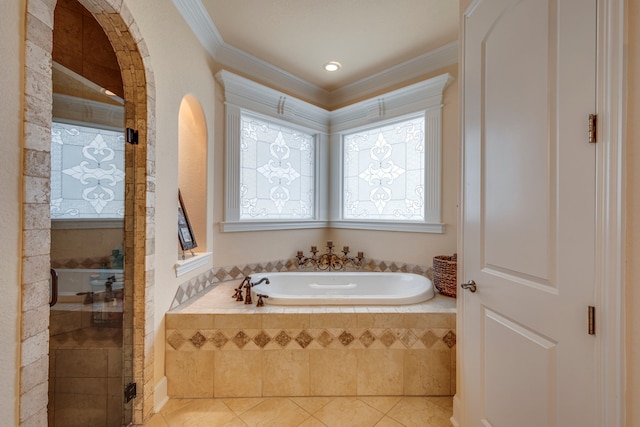 bathroom with tile patterned floors, crown molding, and plus walk in shower