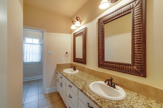 bathroom with vanity and tile patterned flooring