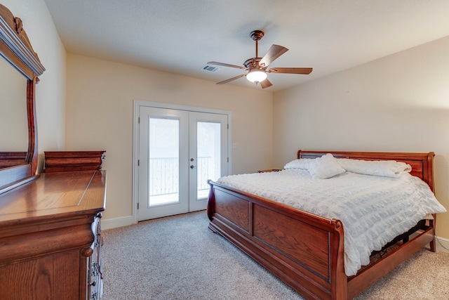 bedroom with ceiling fan, light carpet, access to outside, and french doors