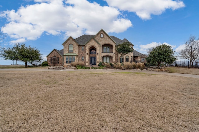 view of front of home with a front lawn