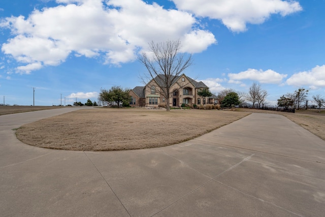 view of front of property with a front lawn