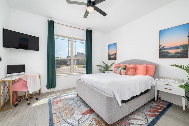 bedroom featuring ceiling fan and light wood-type flooring