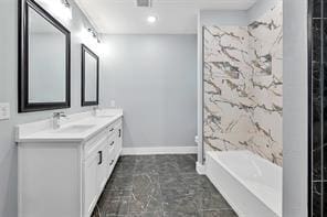 bathroom featuring a tub and vanity