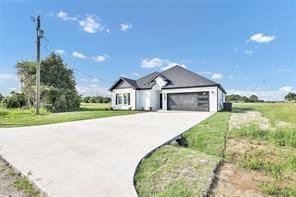 ranch-style home with a garage