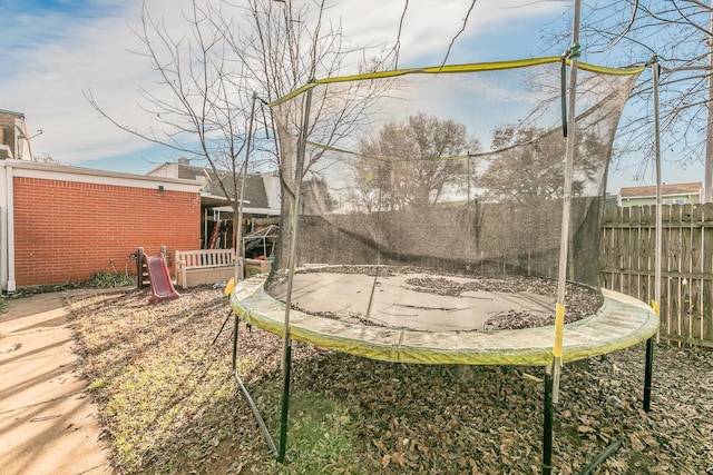 view of yard featuring a trampoline