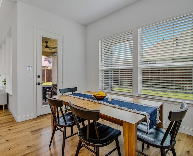 dining area with light wood-type flooring