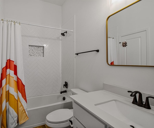 full bathroom featuring toilet, shower / tub combo with curtain, and vanity