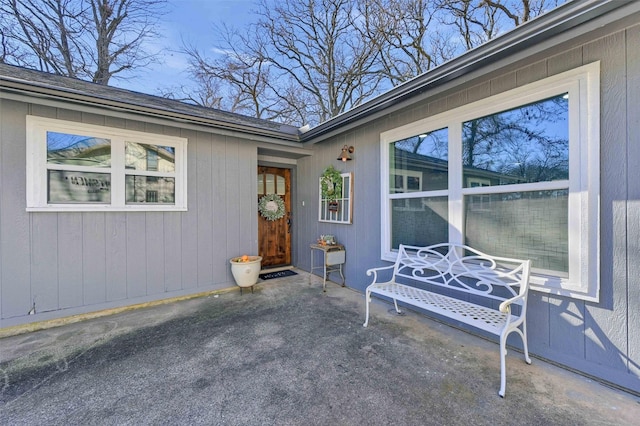 doorway to property featuring a patio