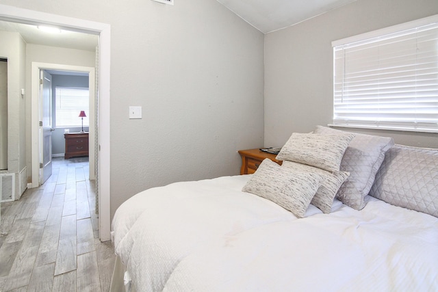 bedroom featuring light hardwood / wood-style floors