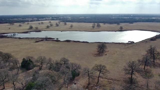 bird's eye view featuring a water view and a rural view