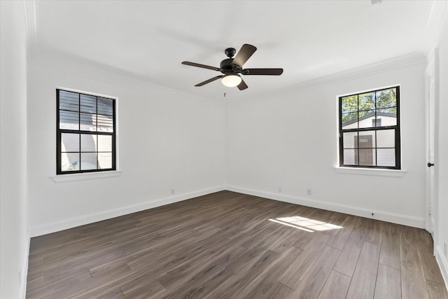 unfurnished room with ceiling fan, crown molding, and dark hardwood / wood-style flooring