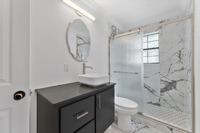 bathroom featuring vanity, a shower with shower door, crown molding, and toilet