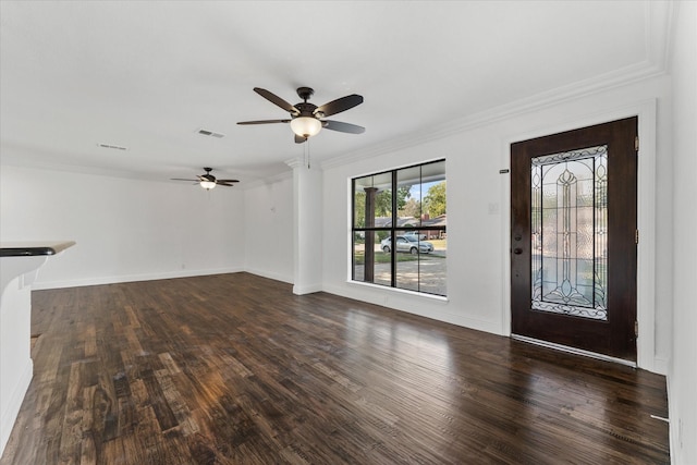 foyer entrance featuring ceiling fan, dark hardwood / wood-style flooring, and ornamental molding