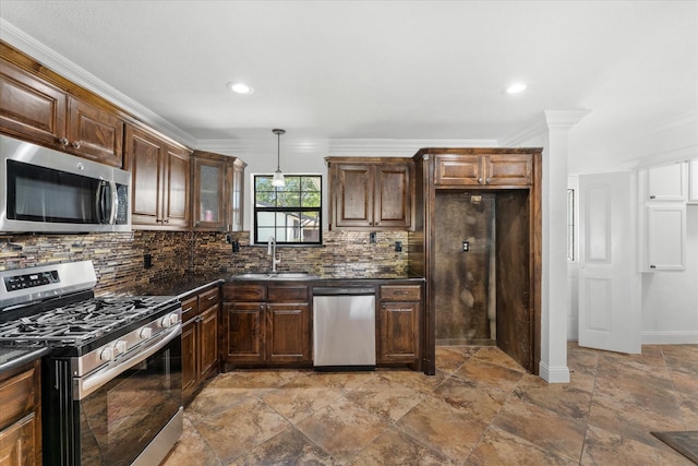 kitchen featuring sink, ornamental molding, decorative backsplash, and stainless steel appliances