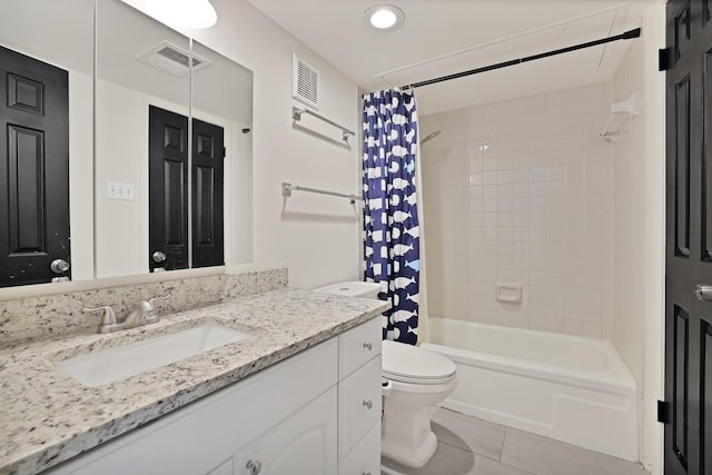 full bathroom with vanity, toilet, tile patterned floors, and shower / bath combo