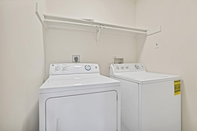 full bathroom with toilet, vanity, shower / bathtub combination with curtain, and tile patterned flooring