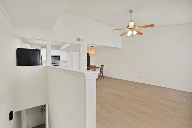 kitchen with white cabinetry, appliances with stainless steel finishes, sink, and decorative backsplash